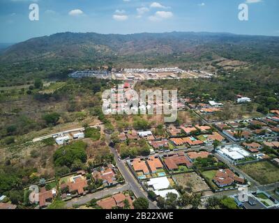 Neighborhood in residential area above top drone view Stock Photo