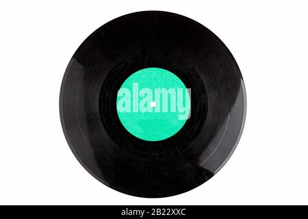 Dirty heavily scratched destroyed vinyl record template, disc with a empty, blank light blue label isolated on white, copy space. Simple cut out Stock Photo