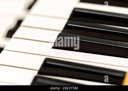 Pipe organ double keyboard macro. Black and white keys extreme closeup, shallow depth of field, detail shot. Stylish musical background texture Stock Photo