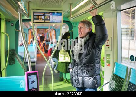 Luxemburg, Luxembourg. 29th Feb, 2020. Francois Bausch (Greens), Luxembourg's Minister of Mobility, travels on a tram in the city of Luxembourg. As of today, local public transport in Luxembourg is free of charge. Credit: Oliver Dietze/dpa/Alamy Live News Stock Photo