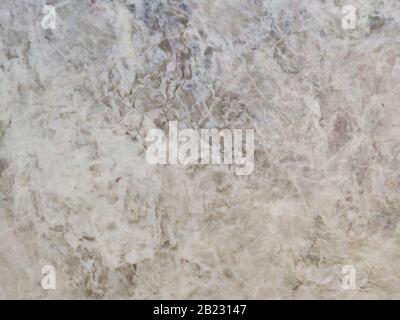 Polished beige marble. Real natural marble stone texture and surface background.White marble texture background pattern with high resolution. Stock Photo