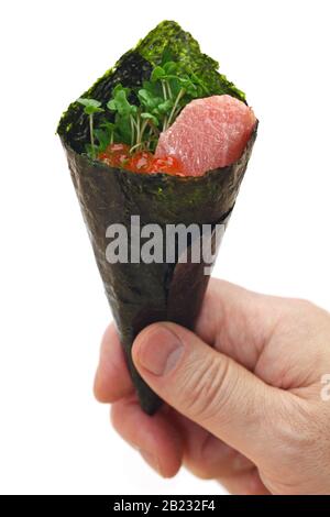This is hand roll fatty tuna & salmon roe sushi Stock Photo