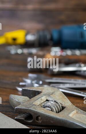 Set of working tools on wooden rustic background Stock Photo