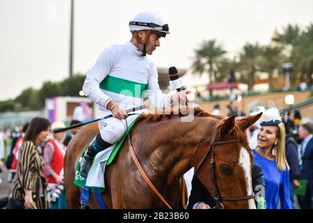 Riyadh, Saudi Arabia. 29th February 2020. Olivier Peslier  in a media interview after wining the Longines Turf Handicap at the inaugural Saudi Cup. Peslier rode Call The Wind trained by Freddy Head Credit: Feroz Khan/Alamy Live News Stock Photo