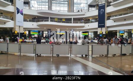 Johannesburg, South Africa - 18 Feb 2020: The ariport in Johannesburg in South Africa where people are busy moving on, arrival hall. Stock Photo