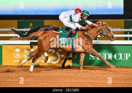 Riyadh, Saudi Arabia. 29th February 2020. A victory for Saudi jockey Adel Alfouradi as he rides  the Jockey Club Cup race at the inaugural Saudi Cup Credit: Feroz Khan/Alamy Live News Stock Photo