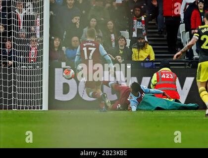 London Stadium, London, UK. 29th February 2020; London Stadium, London, England; English Premier League Football, West Ham United versus Southampton; Sebastien Haller of West Ham United slides the ball in to score his sides 2nd goal in the 40th minute to make it 2-1
