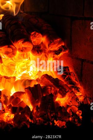 https://l450v.alamy.com/450v/2b23x7r/burning-embers-in-a-very-hot-oven-2b23x7r.jpg