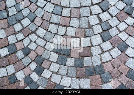 Close-up of cobblestone pavement laid in arches Stock Photo