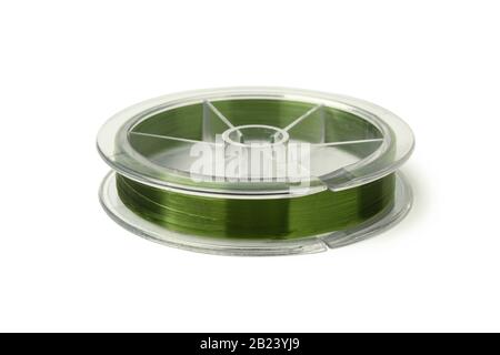 Spool with a fishing line isolated on white Stock Photo