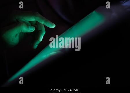 close up of hacker hand stealing data, cyber crime  Stock Photo