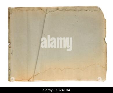 Yellowed rumpled sheet of old paper with torn edges isolated on a white background Stock Photo
