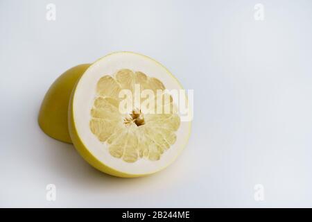 Sliced yellow pomelo on white background, high resolution Stock Photo