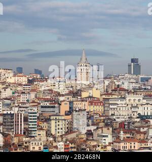 Istanbul / Turkey - 01/20/2019: View of Cityscape with Galata Tower and Golden Horn from garden of the Suleymaniye Mosque. Stock Photo