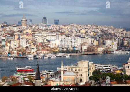 Istanbul / Turkey - 01/20/2019: View of Cityscape with Galata Tower and Golden Horn. Stock Photo