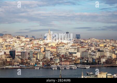 Istanbul / Turkey - 01/20/2019: View of Cityscape with Galata Tower and Golden Horn. Stock Photo