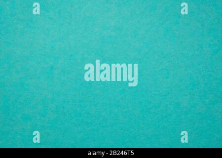 background and texture of teal blue handmade Indian paper created from recycled cotton fabric Stock Photo