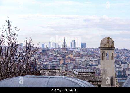 Istanbul / Turkey - 01/20/2019: View of Cityscape with Galata Tower and Golden Horn from garden of the Suleymaniye Mosque. Stock Photo