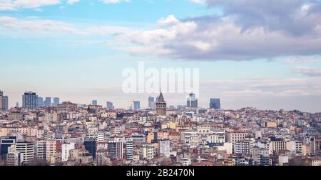 Istanbul / Turkey - 01/20/2019: View of Cityscape with Galata Tower and Golden Horn from garden of the Suleymaniye Mosque. Stock Photo