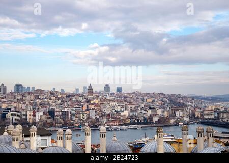 Istanbul / Turkey - 01/20/2019: View of Cityscape with Galata Tower and Golden Horn from garden of the Suleymaniye Mosque. Stock Photo