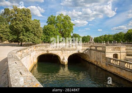 The Jardins de la Fontaine in Nîmes. The Park are landscaped neo-classical gardens built around the source of the water spring, Gard, Provence, France Stock Photo