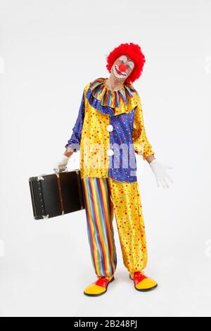 clown with suitcase Stock Photo - Alamy