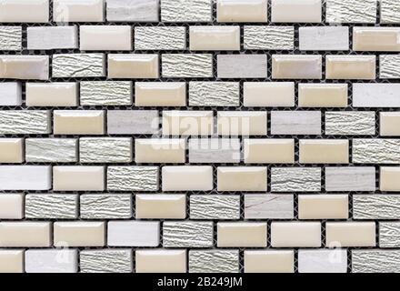 Ceramic tile mosaic laid out in the form of brickwork. Rectangular tile mosaic. Stock Photo