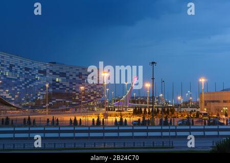 Sochi, Krasnodar Krai, Russia - June 06.2017: Beautiful evening lighting of the Ice Palace of sports 'iceberg' and the Bowl of the Olympic Flame in th Stock Photo