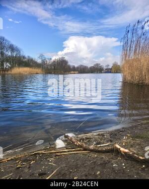 Lake in Holland with distant storm cloud on the horizon Stock Photo