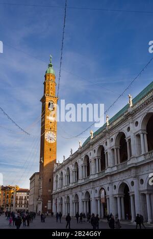 Vicenza, Italy. December 26, 2016: Piazza dei Signori and the Basilica Palladiana at Christmas time with the lights cascade from Torre Bissara. Stock Photo