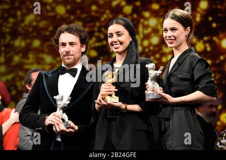 Berlin, Germany. 29th Feb, 2020. Award Winners Elio Germano, Baran Rasoulof and Paula Beer pose at the closing ceremony during the 70th Berlin International Film Festival/Berlinale 2020 at Berlinale Palace on February 29, 2020 in Berlin, Germany. Credit: Geisler-Fotopress GmbH/Alamy Live News Stock Photo