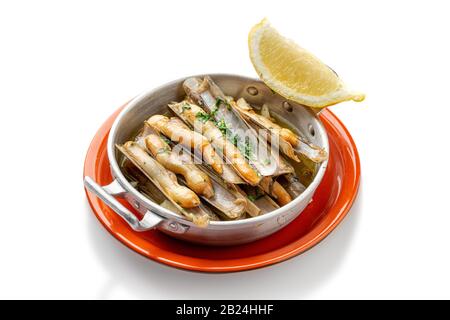 Razor clams with lemon Algarve recipe. Seafood Portugal Stock Photo