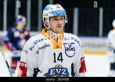 Livio Stadler # 14 (EV Zug) and Claudio Cadonau # 34 (EV Zug) celebrate ...