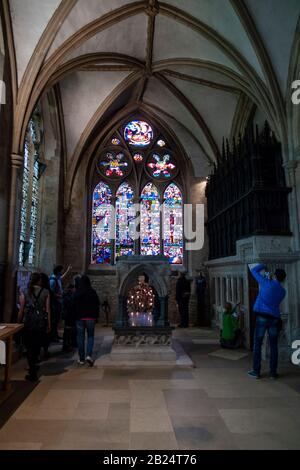 Tourists admire and photograph Stained Glass Windows at the Oxford Christ Church in Oxford, England, UK. Stock Photo