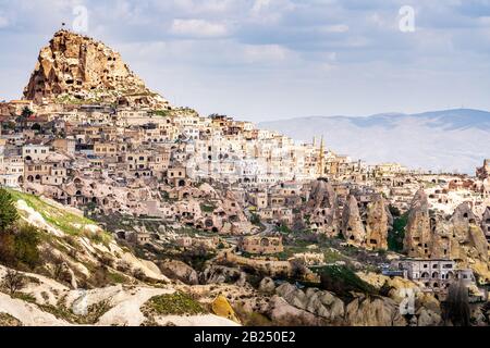 Uchisar town and castle from Pigeon Valley, Cappadocia, Turkey Stock Photo