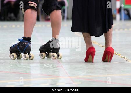Madrid, Spain. 29th February, 2020. Detail of the feet of a player and a Non Skating Official during the game qualifying for the Spanish roller derby championship held in Madrid. © Valentin Sama-Rojo/Alamy Live News. Stock Photo