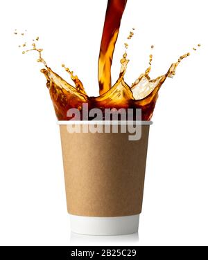 pouring coffee into disposable paper cup isolated on white background Stock Photo