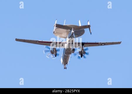 Feb 25, 2020 Sunnyvale / CA / USA - Low angle view of Northrop Grumman E-2 Hawkeye aircraft belonging to the US Navy 'Black Eagles' squadron, heading Stock Photo