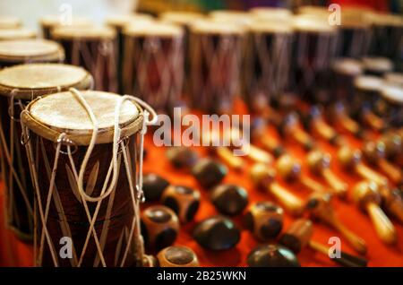 Various colorful musical instruments drums in asia street market near ...