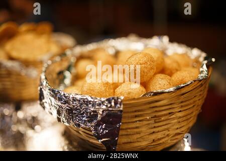 Ingredients samosa closeup, a beautiful Indian dish, national food in a basket. Night Market Goa India Stock Photo