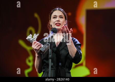Berlin, Germany. 29th Feb, 2020. Actress Paula Beer of film 'Undine' speaks after receiving the Silver Bear for Best Actress during the awards ceremony of 70th Berlin International Film Festival in Berlin, capital of Germany, Feb. 29, 2020. Credit: Shan Yuqi/Xinhua/Alamy Live News Stock Photo