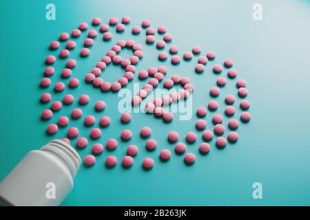 Pink tablets in the form of B12 in the heart on a blue background, spilled from a white can. Food supplement concept Stock Photo