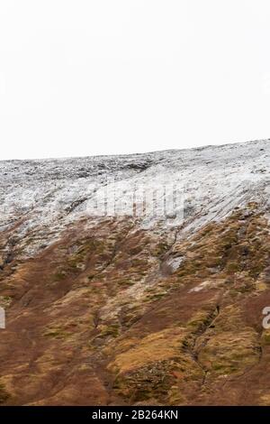 Snow line on mountain slope in Iceland close to the West fjords Stock Photo