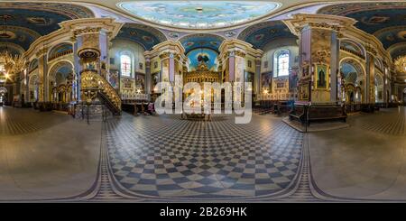 360 degree panoramic view of LVIV, UKRAINE - AUGUST 2019: Full spherical seamless hdri panorama 360 degrees inside interior of old gothic uniate church in equirectangular projecti