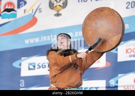 Male dancer in national clothes aboriginal people expression dancing with tambourine. Concert Koryak Dance Ensemble Mengo. Kamchatka Peninsula Stock Photo