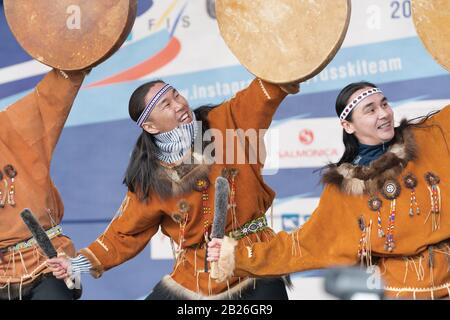 Group aborigine dancer in traditional clothes native people dancing with tambourine. Concert Koryak Dance Ensemble Mengo. Kamchatka Peninsula Stock Photo