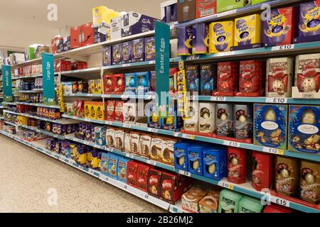 Supermarket aisle full of Easter eggs, Tesco, Evesham, Worcestershire ...