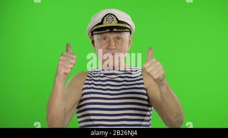 Old man thumbs down Stock Photo - Alamy