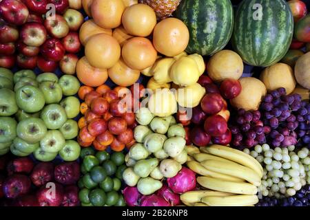 Various fresh summer exotic fruits for sale on market Stock Photo