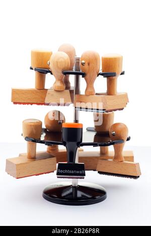 Stamp holder with many wooden stamps as a symbol of bureaucracy Stock Photo  - Alamy